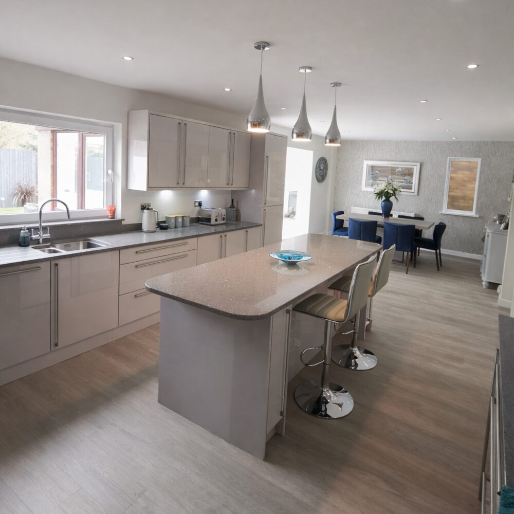 Acorn Installations fitted this modern kitchen with island and dining area