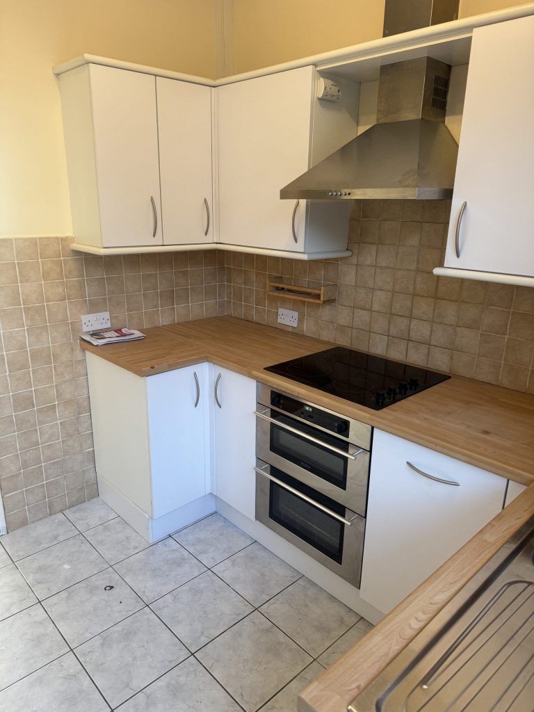 After photo of the slab kitchen refurbishment in Sketty project