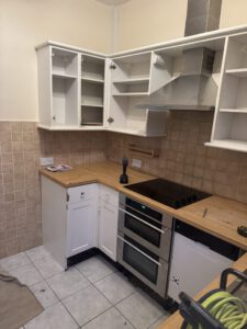 Before photo of the slab kitchen refurbishment in Sketty project