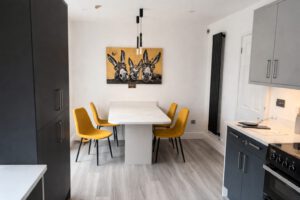Modern dining with donkey artwork