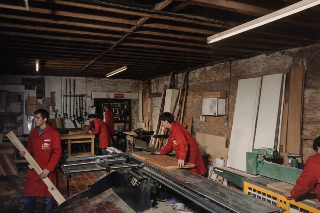 Woodworking team in action at the workshop
