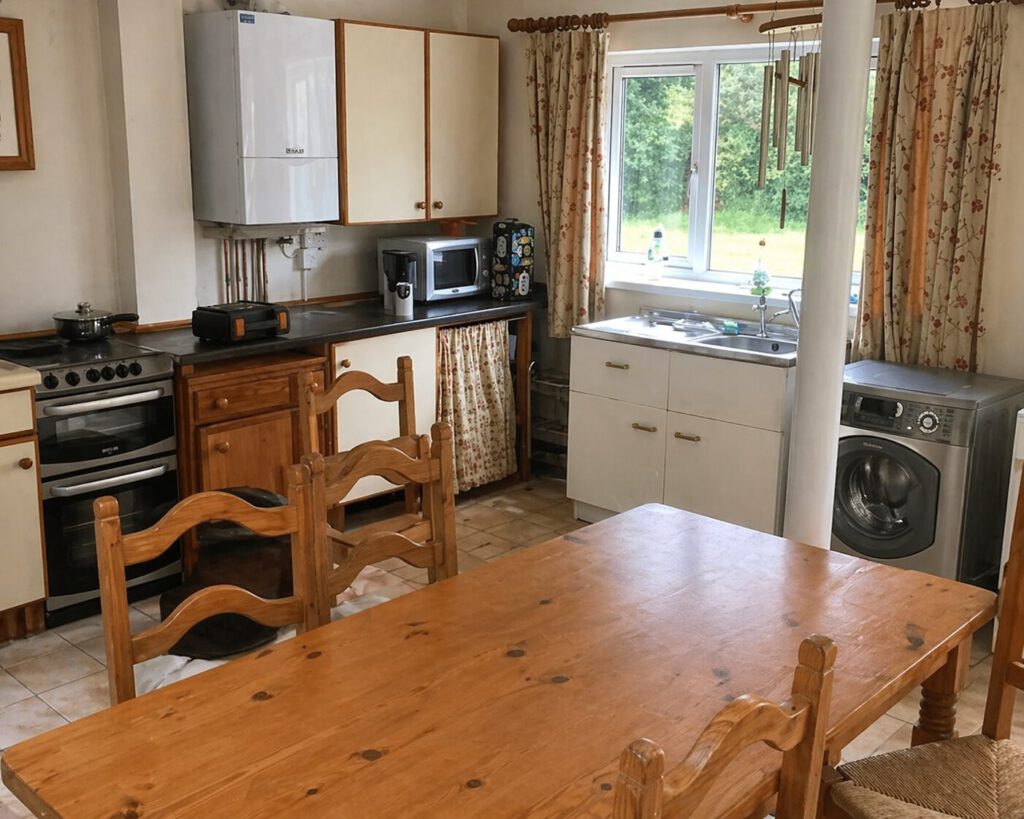 Before photo of the shaker kitchen with curved island in Bishopston project